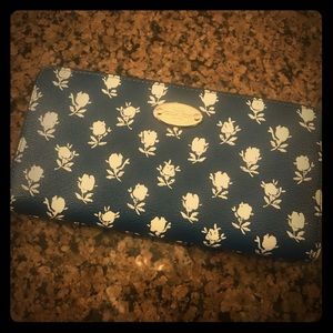 Unsure if it’s authentic Navy Coach Zip Around Wallet